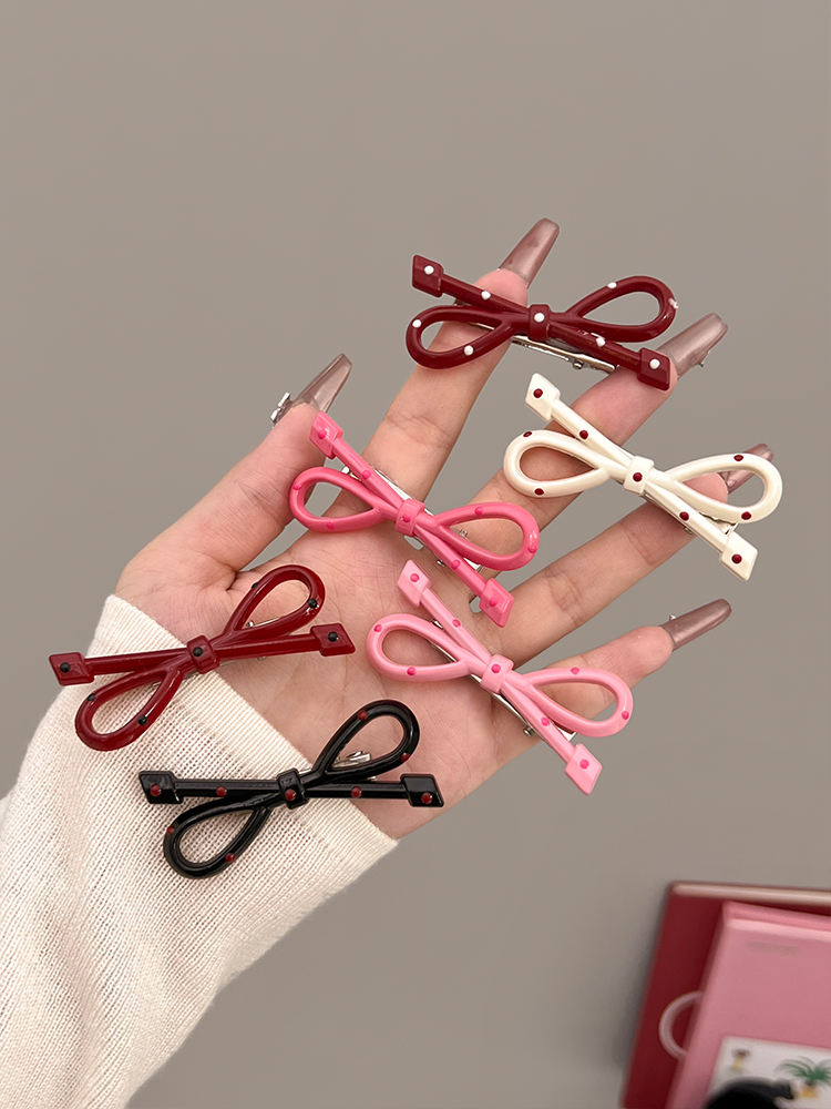 مشبك شعر نسائي أنيق بنقاط البو - مراجعة Women Accessories Brands وسعره